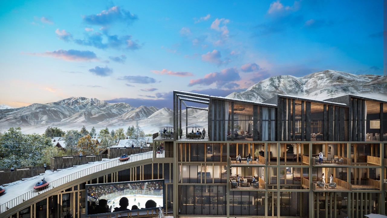 A winter view of The Slope in Heber, showcasing the luxury resort architecture, outdoor tubing hill, and surrounding snow-covered mountains.