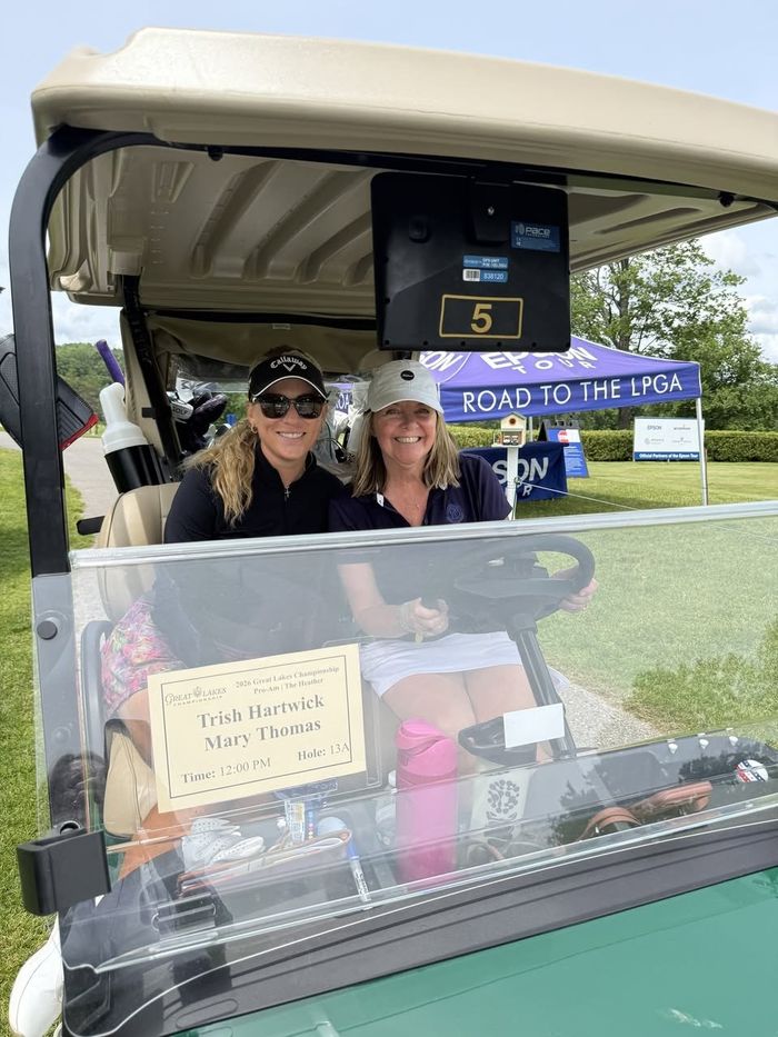 Trish Hartwick in a golf cart at the Pro-Am