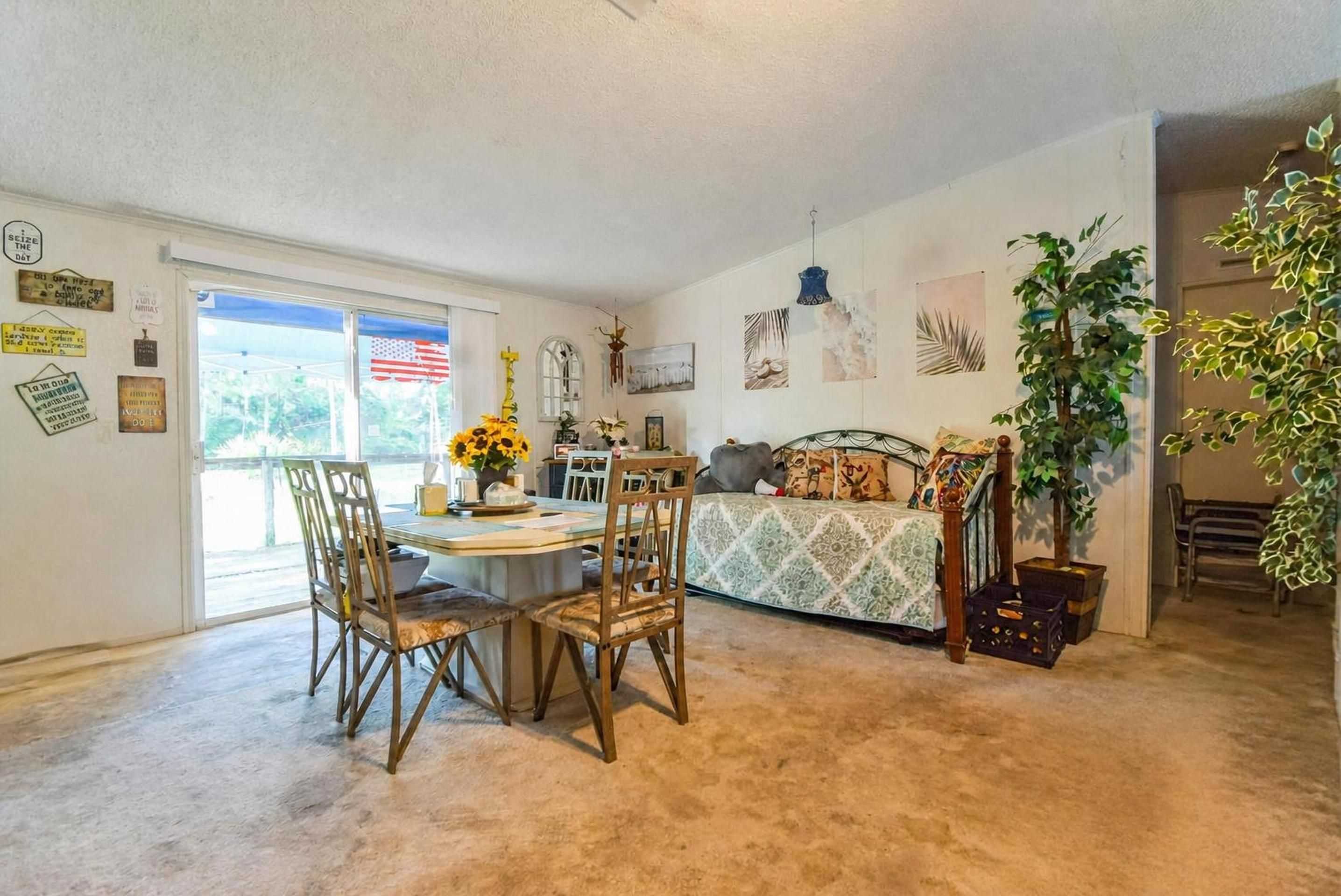 Dining and living area at 222 Plumosa Drive