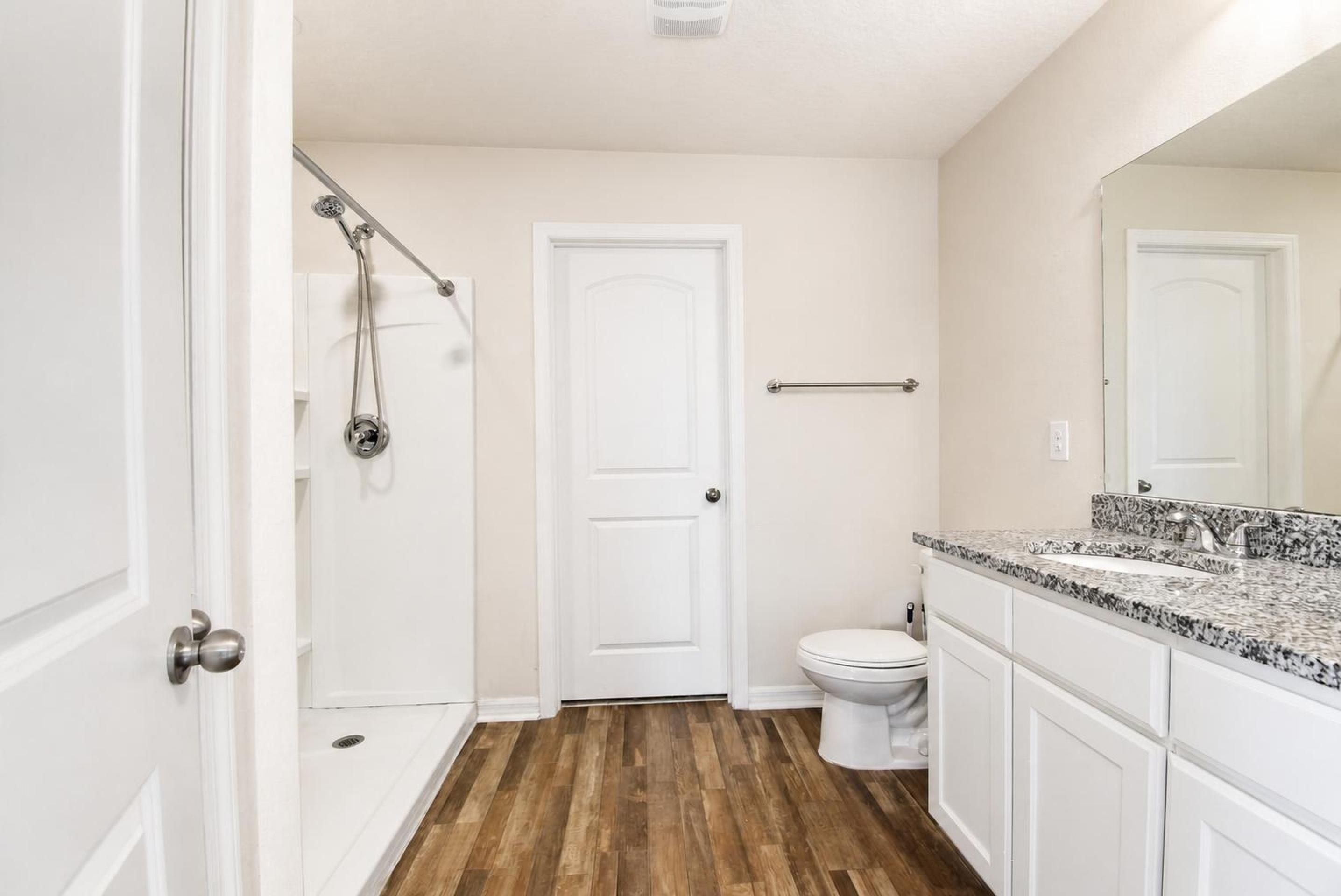 Primary bathroom at 205 River Hill Drive