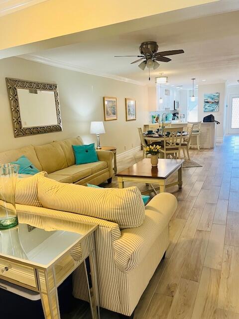 Remodeled Delray Beach rental with quartz countertops stainless steel appliances and wood tile floors