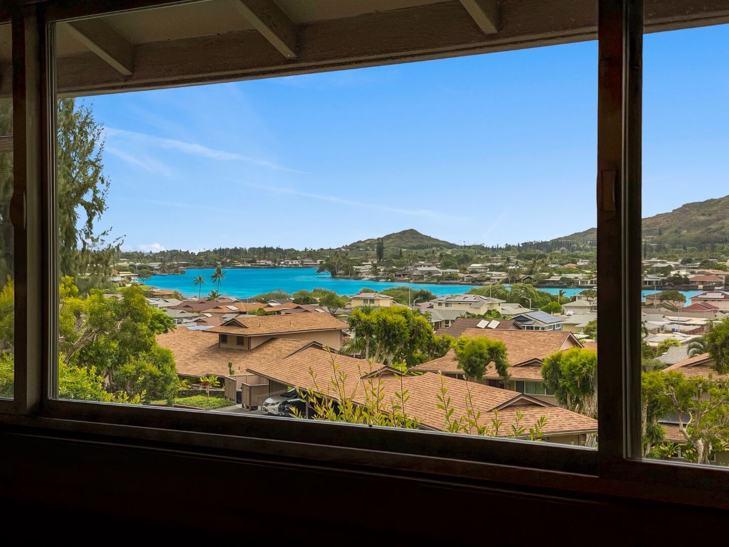 View from the upstairs primary suite over Enchanted Lake